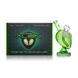 Hemper alien bong beside branded box, green alien head body with frosted eyes and recessed joint for daily use