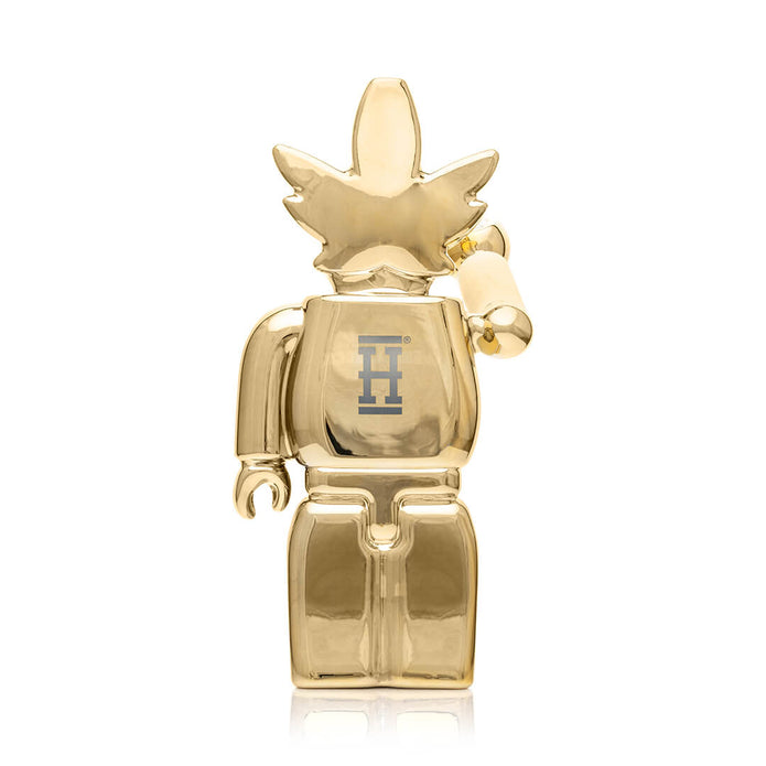 Rear view of mirror-gold Weedbrick XL bong showing Hemper “H” logo on back, high-shine character glass design