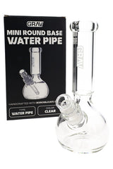 Clear 7″ GRAV glass bong with round base, ice pinch, and concave neck shown in angled close-up view