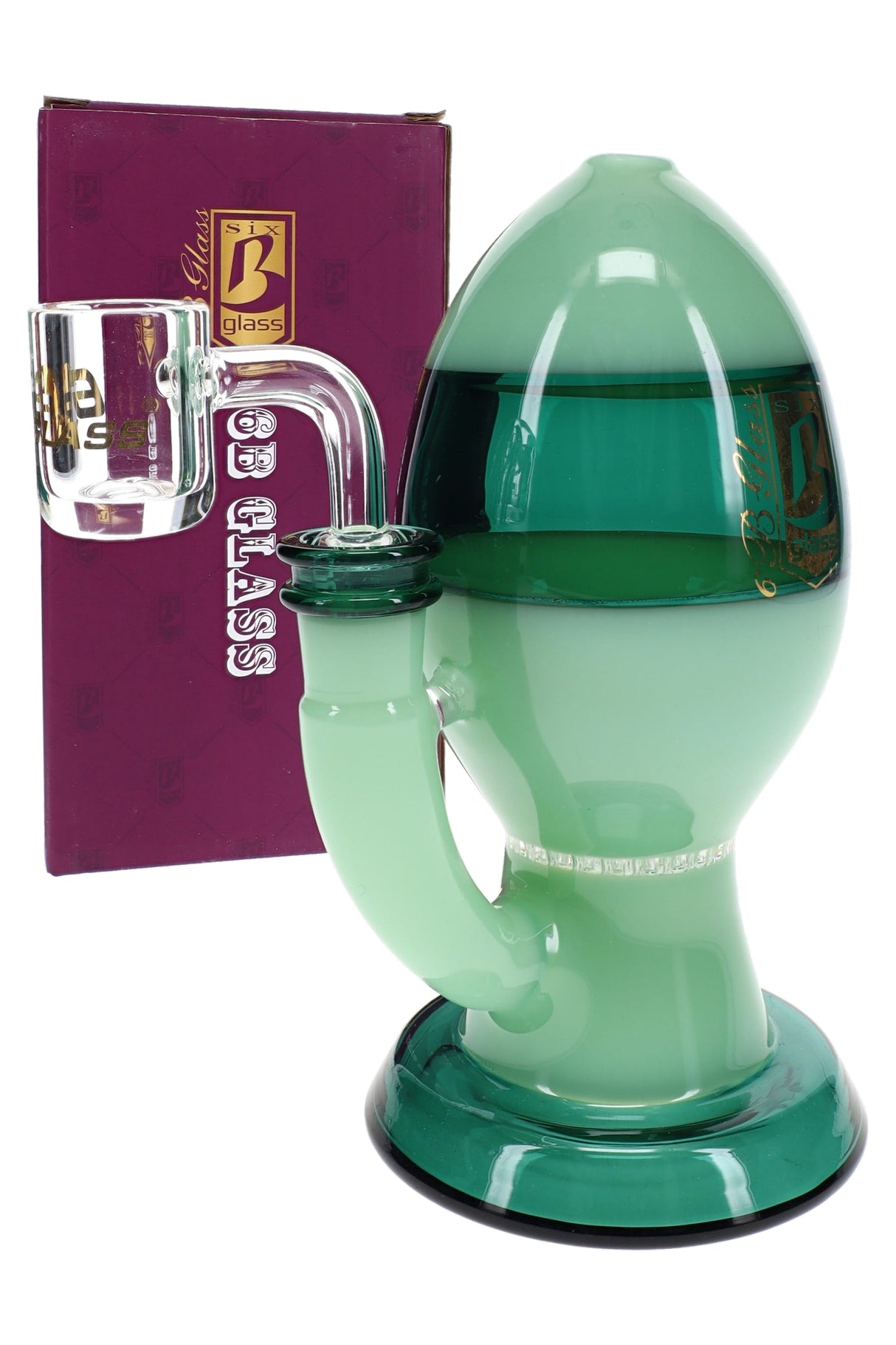 Green glass egg dab rig with dark accent band, compact beaker-style body, and clear quartz-style banger