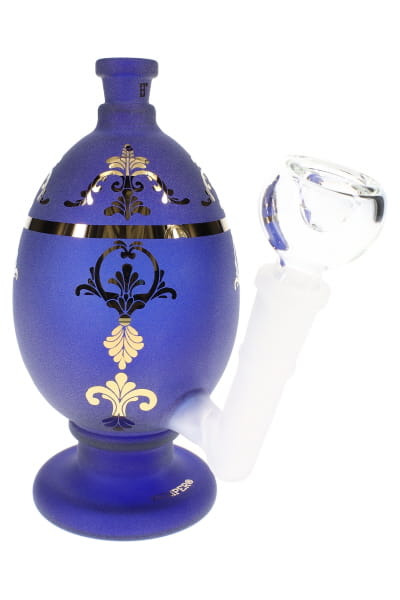 Close-up of jeweled egg glass bong with frosted blue body, ornate gold-look accents, and clear bowl