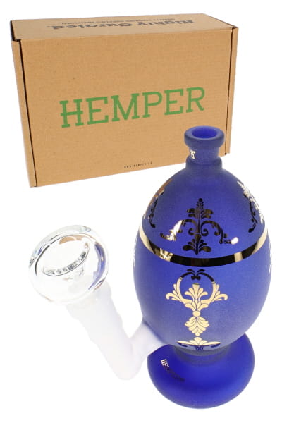 Frosted blue 6-inch glass bong with jeweled egg shape, clear bowl, and HEMPER retail box in angled view