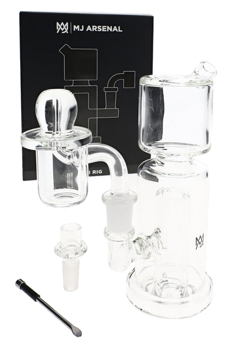 MJ Arsenal mini dab rig kit with clear glass column rig, 10 mm quartz banger, carb cap, bowl, dab tool, and box