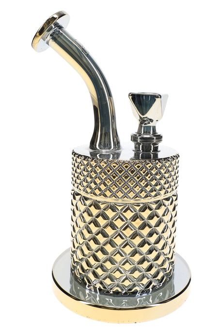 Gold Jane West glass water pipe with metallic textured chamber, disc mouthpiece, and sturdy base
