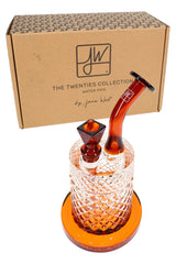Amber Jane West glass water pipe with branded box, textured chamber, and coordinated bowl