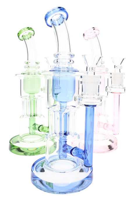 Colorful glass recycler bong group with blue, green, and pink accents beside upright stemless bodies