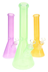 Colored 14-inch glass beaker bong lineup in green, pink, and yellow with ice pinch and removable downstem