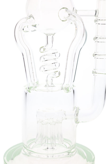 Close-up glass recycler bong showing spiral tube, clear chamber, and sprinkler perc with blue accents