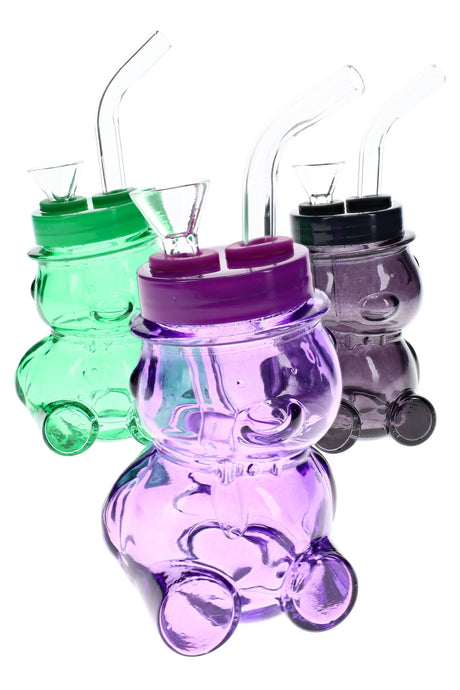 Colored bear-shaped glass bong group with green, purple, and smoke bodies, clear bowls, and bent mouthpieces