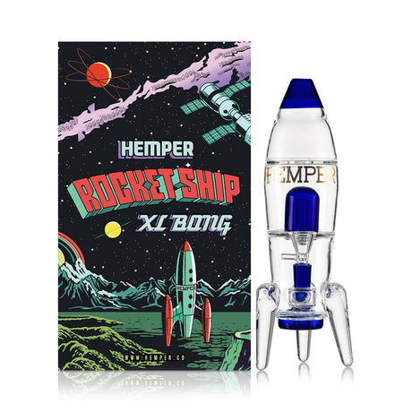 Blue-accented HEMPER rocket ship glass bong beside illustrated retro space retail box