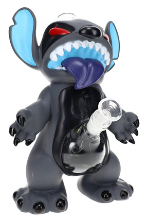 Creepy creature glass water pipe with 14.5 mm joint, plastic monster design, and tabletop size