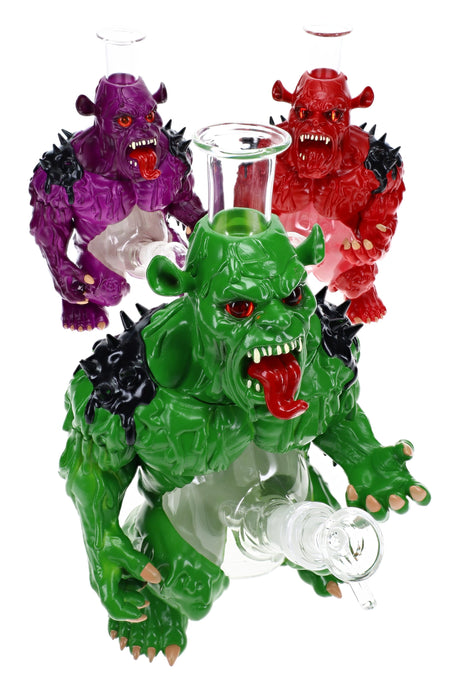 10½″ glass and plastic monster bong with sculpted creature body, green accents, and clear neck