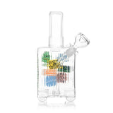 Rear view of the clear HEMPER Suitcase Medium Bong showing ribbed glass, sculpted wheels, and glass bowl