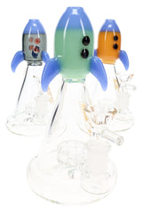 Assorted 7″ rocket ship glass bongs with blue fins, 14.5 mm bowls, and beaker bases