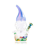 Front angle of the Trippy Gnome XL bong showing its blue hat, white beard and colorful garden artwork