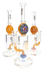 Assorted 6B Glass donut perc bongs with orange donut tops, sprinkle percs, and clear bowls