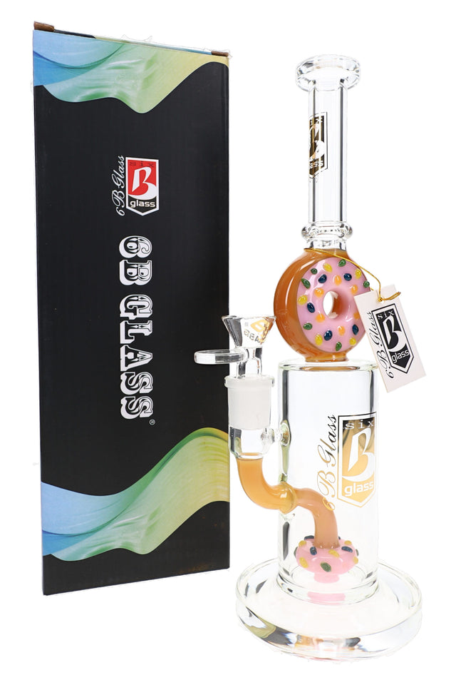Pink 6B Glass donut perc straight bong with sprinkle donut accents, clear bowl, and retail box