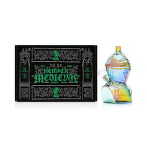 Hemper Medieval Knight 6″ glass bong with iridescent armored body beside black illustrated retail box