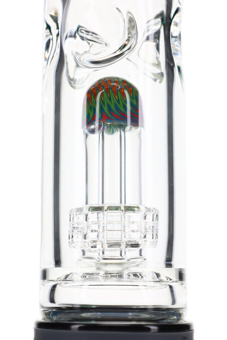 Close-up of glass bong dome matrix perc inside clear tube with colorful cap and thick chamber walls