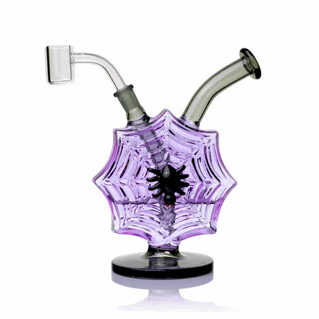 Rotating view of MJ Arsenal Nightcrawler dab rig with purple spiderweb chamber, black spider accent, and quartz banger
