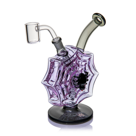 Three-quarter view of MJ Arsenal Nightcrawler dab rig with dimensional purple spiderweb body, black spider, and banger