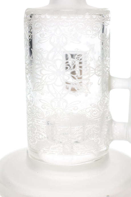Close-up of 6B Glass bong chamber with intricate frosted lotus artwork and internal showerhead percolator