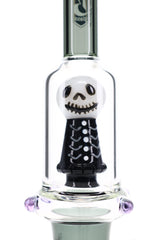 Close-up of 6B Glass bong showing white skull character showerhead perc with black sculpted body