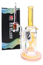 Color-changing 6B Glass dab rig with yellow fumed accents, clear banger, pointed glass dab tool, and box