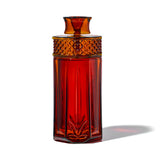 NWTN Home Highball gravity bong in Baltic Amber with tall faceted glass shell and diamond-textured collar