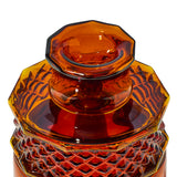 Close-up of Baltic Amber Highball gravity bong showing the removable 14 mm glass bowl and faceted top