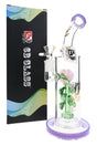 6B Glass bong with purple accents, a pink glass rose, curved neck and handled bowl beside its branded box.