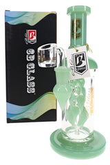 Mint-accented 6B Glass vine leaf dab rig with a clear banger and leaf-shaped side detail beside its branded box.