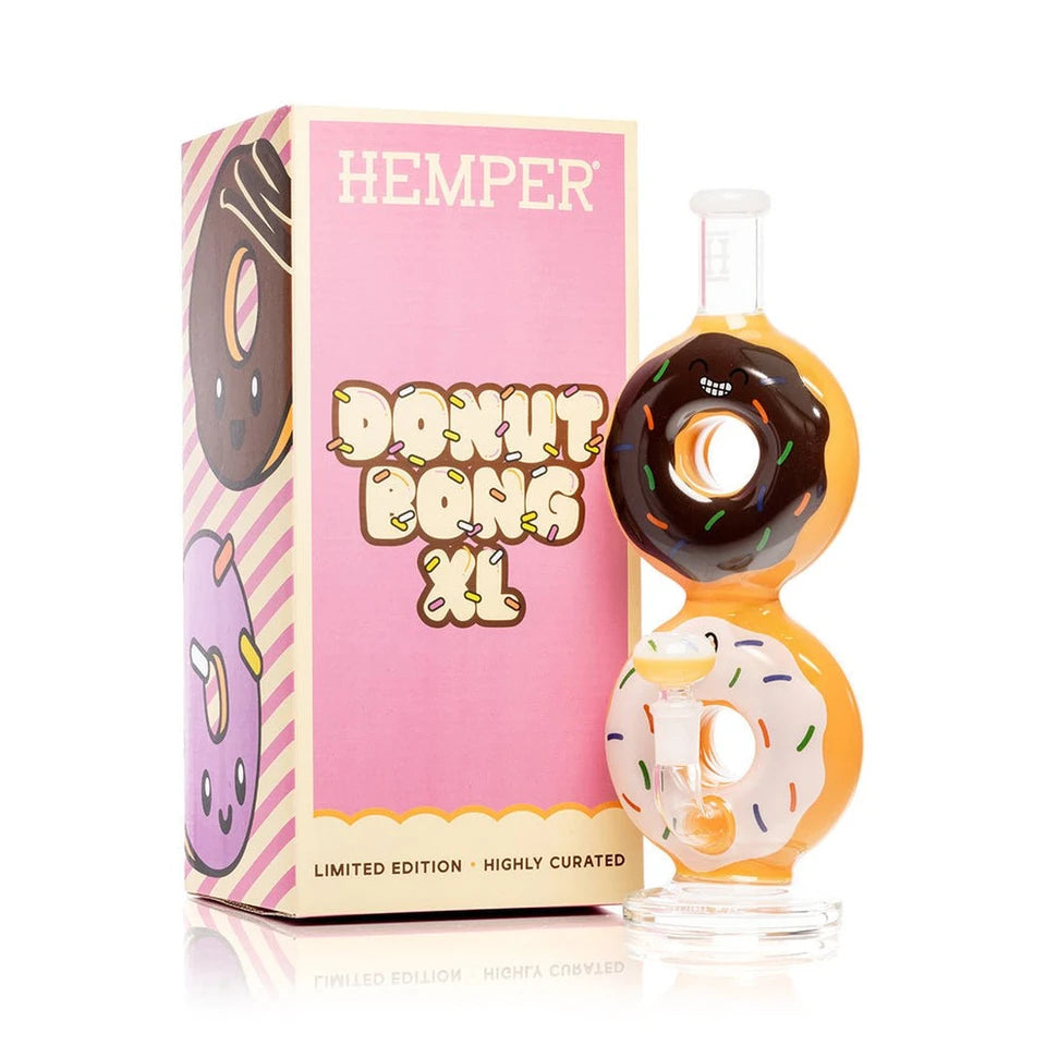 Hemper Donut XL bong with two stacked frosted donuts, colorful sprinkles and a matching bowl beside its pink box