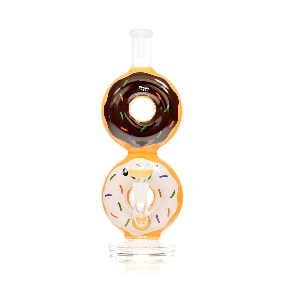 Front view of the Hemper Donut XL bong showing brown and white icing, sprinkle details and open donut centers