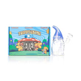 Hemper Trippy Gnome glass bong with a blue hat and clear bowl beside its colorful illustrated retail box