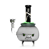 Front view of Hemper Cauldron XL bong showing its smiling face, small feet, black mouthpiece and cat bowl