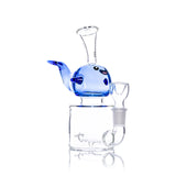 Angled view of Hemper Blue Whale glass bong with a raised tail and inline perc visible in the clear base