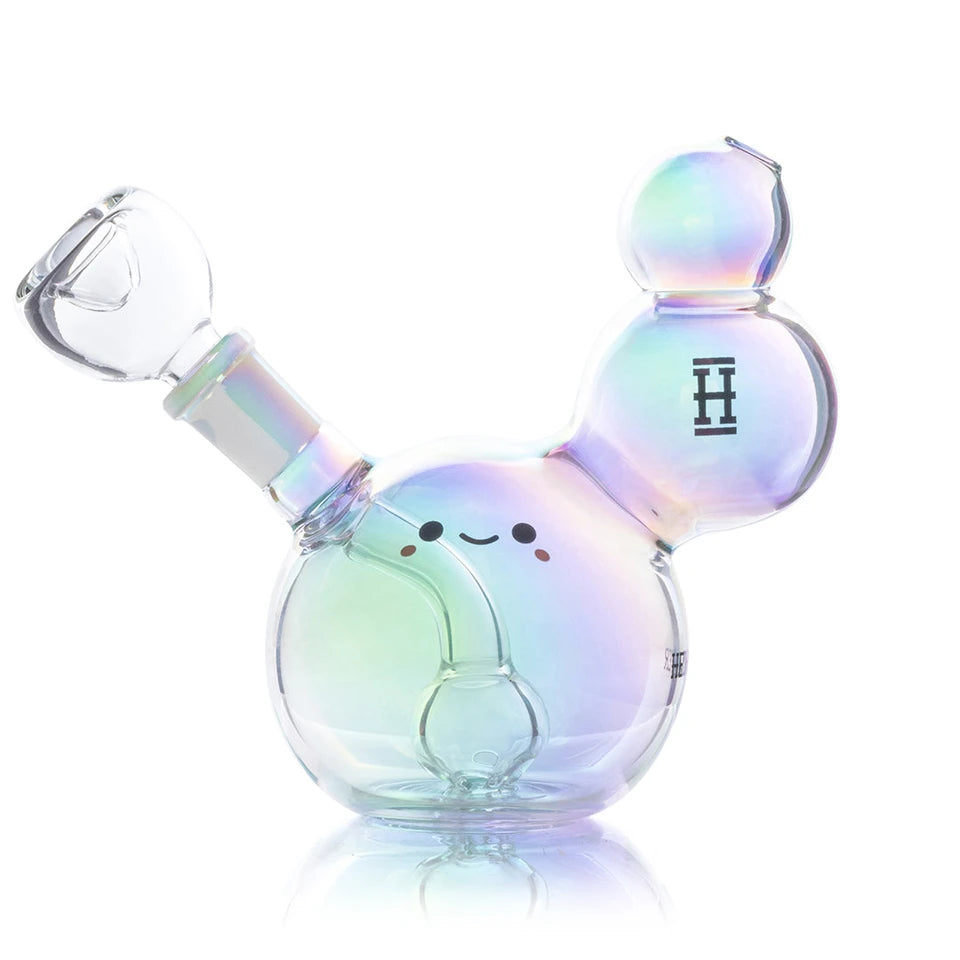 Front view of Hemper Bubble bong with a smiling face, rosy cheeks, tilted bubble neck and clear glass bowl