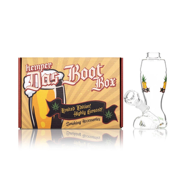 Hemper Das Boot clear glass bong with a removable bowl beside its gold illustrated beer-boot retail box