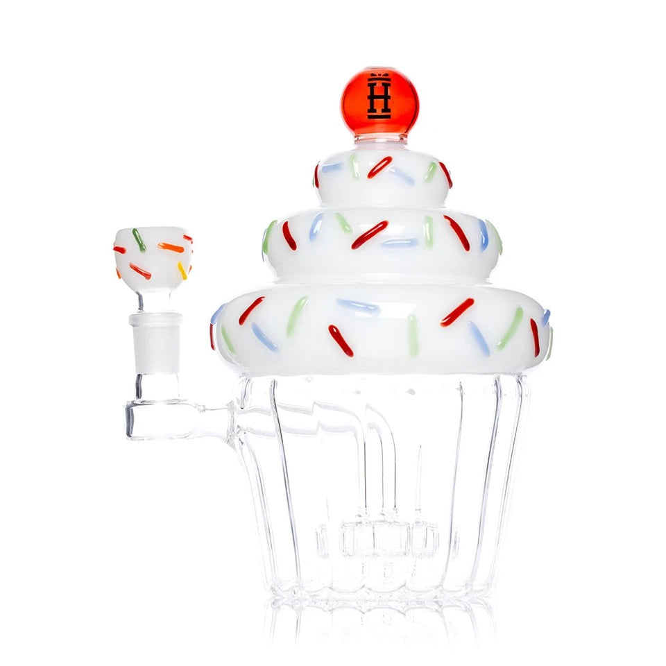 Hemper Cupcake XL glass bong with a matching bowl at left and showerhead perc visible in the clear base
