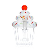 Bowl-end view of Hemper Cupcake XL bong with a sprinkle-decorated bowl in front of stacked white frosting