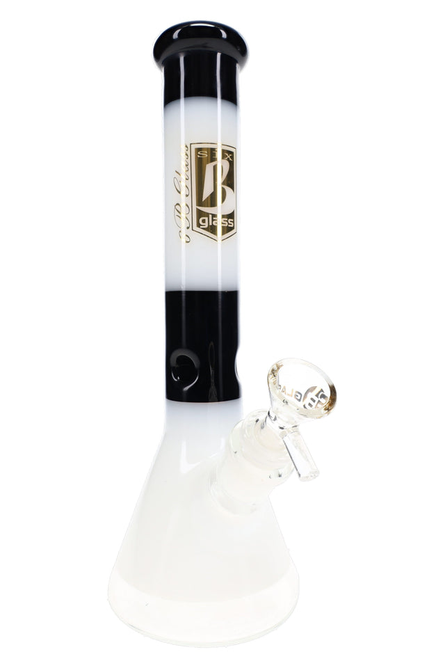 Black and white 6B Glass beaker bong with gold neck branding, ice pinch, and clear handled glass bowl.