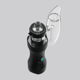 Top-angle view of Dr. Dabber XS e-rig showing clear carb cap, quartz chamber area, and curved glass attachment
