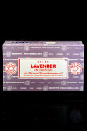 Box of Satya Nag Champa incense sticks with various incense labels visible.