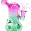 Purple and green metallic glass mini bong highlighting the curved intake and perc through the chamber.