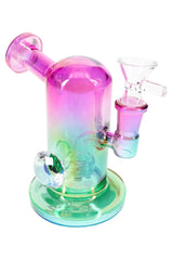 Purple and green metallic glass mini bong highlighting the curved intake and perc through the chamber.