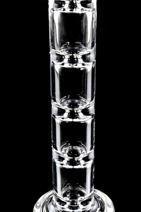 Close-up of stacked ladder perc chambers on the GRAV Upline glass bong showing multiple mini cooling sections.