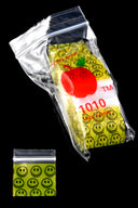 Happy-face yellow print miniature 1″ × 1″ design baggies, bundle of 1000 with visible zipper closure, studio lighting