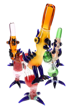 9-inch color-changing glass parrot bubbler with cobalt accents and clawed tripod base; compact water chamber; Assorted Colors.