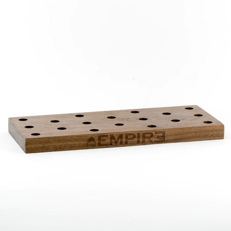 Warm studio view of 12″ wooden bowl display stand with multiple sockets and Empire etched logo